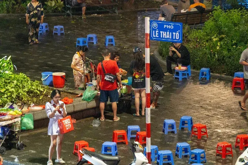 The street vendors and tourist in the Old Quarter of Hanoi