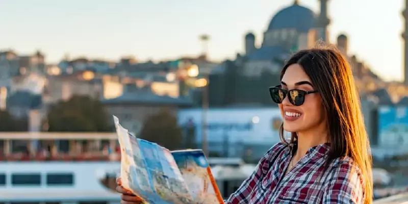 Solo female exploring Istanbul with a map in hand.
