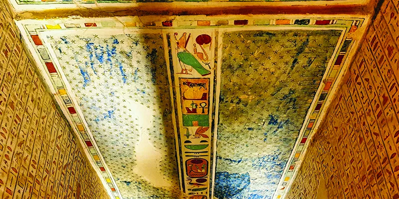Cartouches of Ramesses IV along with his royal epithets, surrounding a star-patterned ceiling in the middle chamber of the Tomb of Ramesses IV (KV2) in the Valley of Kings, Luxor, Egypt.