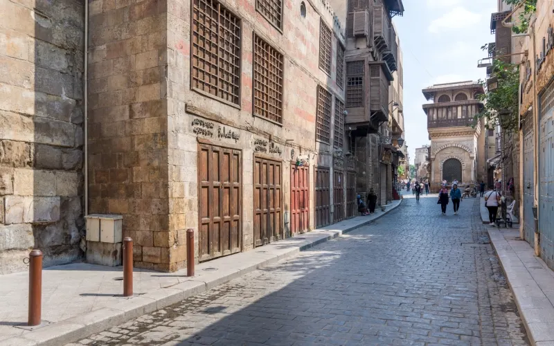Moez Street with Sabil-Kuttab of Katkhuda historic building at the far end, Al Aqmar Mosque Cairo