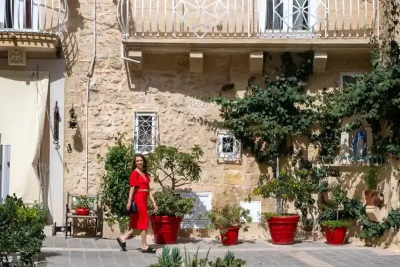 Woman explores old town square, Rabat