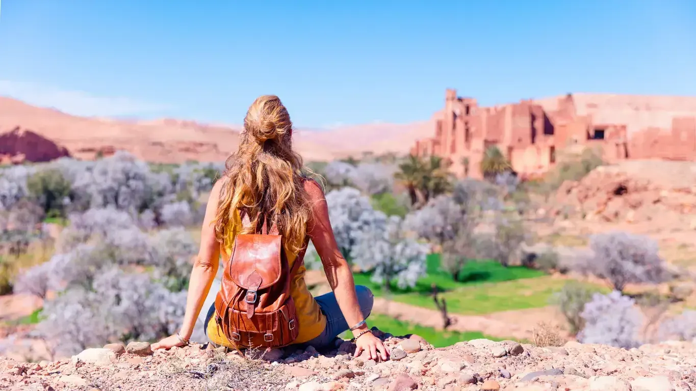 Woman traveler admiring beautiful city in Morocco
