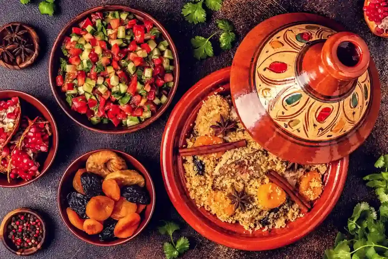Traditional moroccan tajine of chicken with dried fruits and spices
