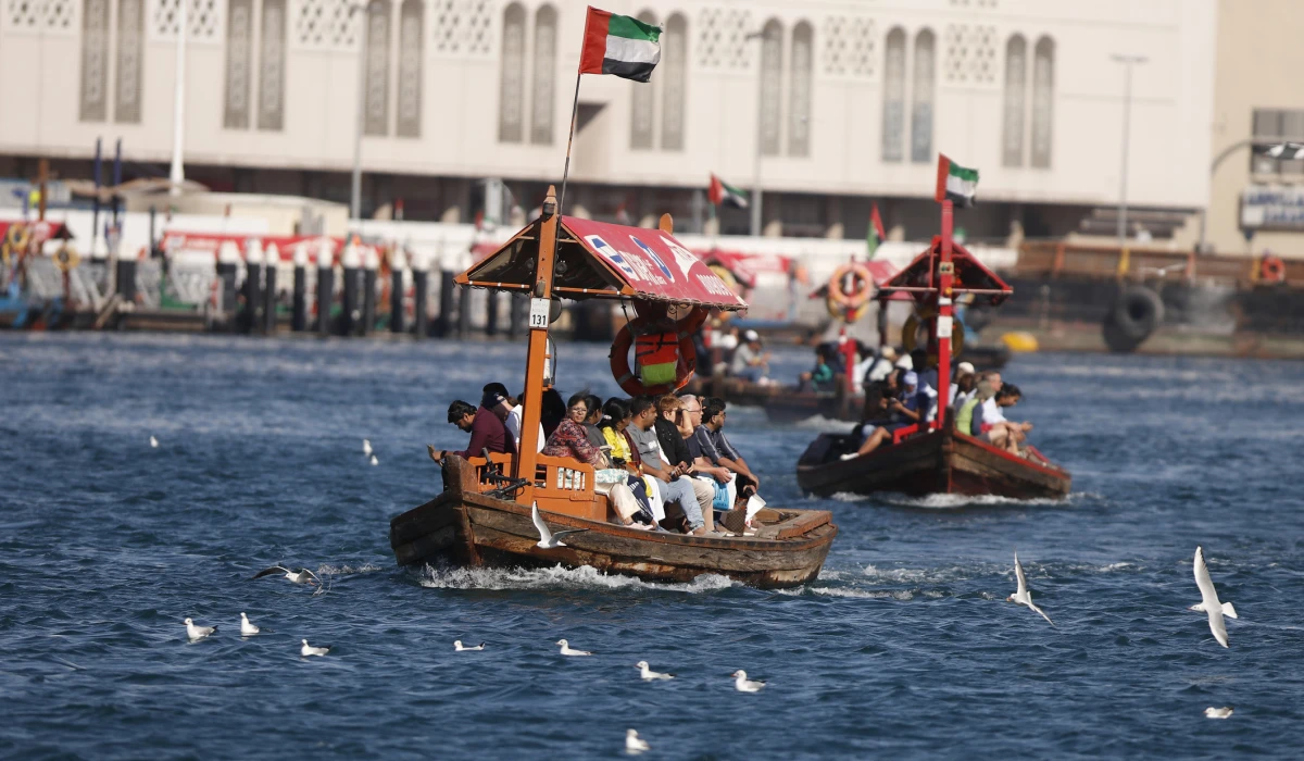 Old dubai creek known as bur dubai traditional abra boat service