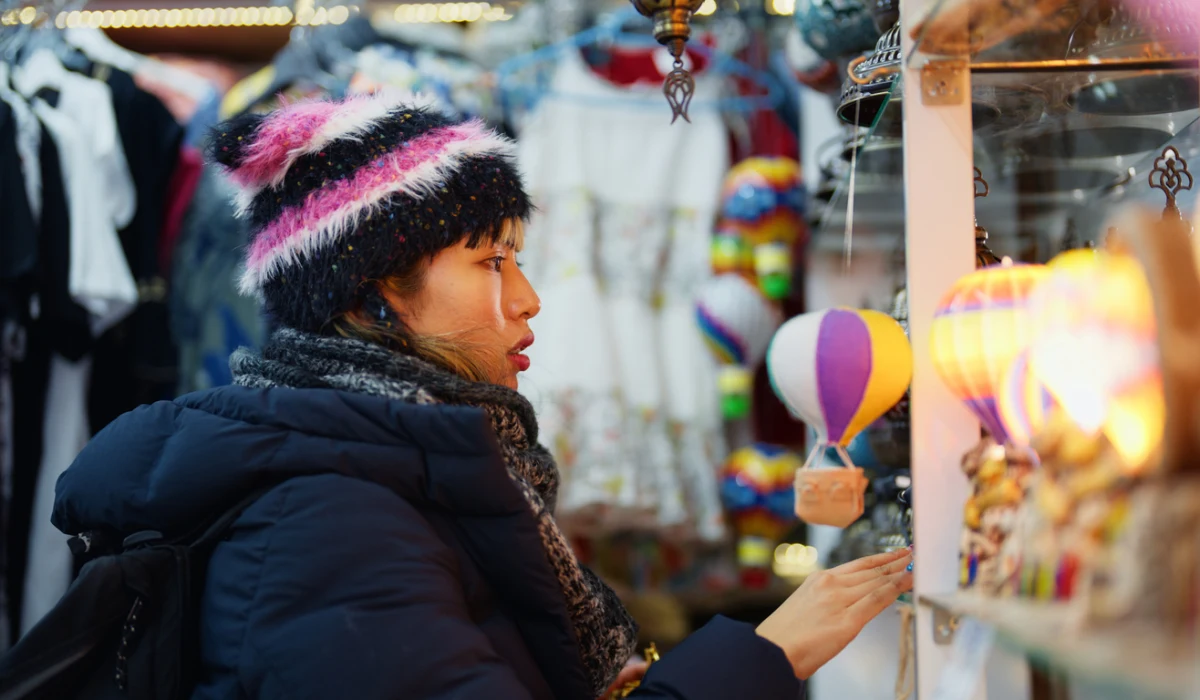 Woman solo traveler choosing souvenir in a shop in Cappadocia
