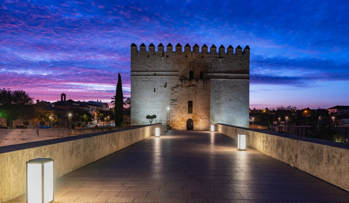 Torre de la Calahorra at dawn at one end of the Roman bridge of Cordoba, currently the Living Museum of Al-andalus, Andalucia.