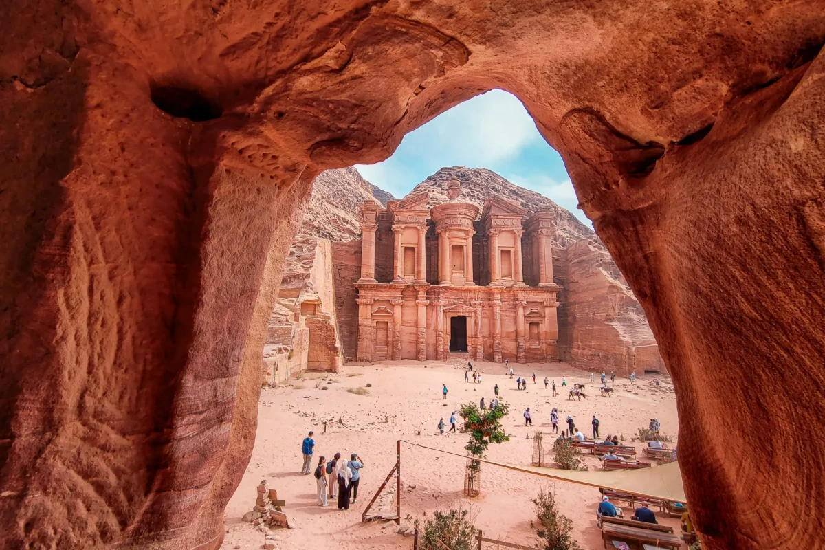 Petra archaeological city appearing beyond the Siq during the Cairo to Petra Jordan itinerary