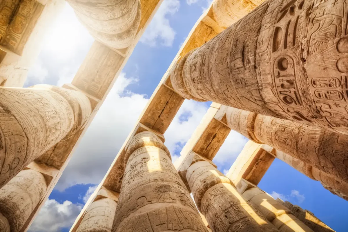 Towering columns and carved reliefs inside Karnak Temple during the Luxor East Bank tour