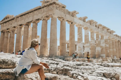 Relaxed woman admiring the view of the Parthenon