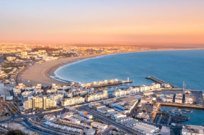 Sunset over Agadir with bay, beach, and marina from Oufla fortress.