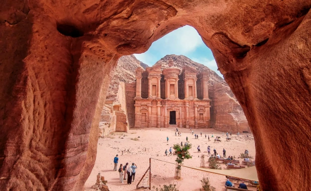 Petra archaeological city appearing beyond the Siq during the Cairo to Petra Jordan itinerary