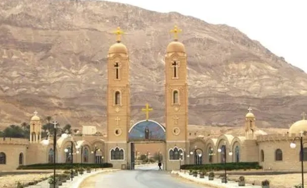 Monastery of St. Anthony set against the Eastern Desert cliffs during the religious tour