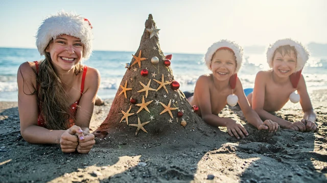 A mother with her children enjoying the redsea beaches in christmas, New Year Holidays in Egypt