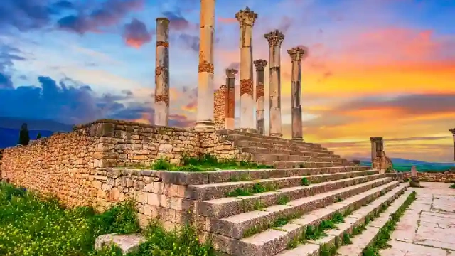 Tempio Capitolino nelle luci del tramonto; Città storica della Mauritania romana, volubilis cosa vedere