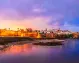 Rabat, Marruecos: Vista del atardecer desde la costa del océano Atlántico sobre la ciudad y la fortaleza de la Kasbah de los Udayas