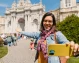 A tourist taking a selfie in front of Dolmabahçe Palace in Istanbul.