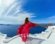 Mujer disfruta de la vista sobre Santorini, Paquete a Turquía y Grecia