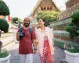 Couple enjoying their visit to Thailand’s historic Wat Phra.