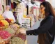 A visitor discovering the exotic aromas and spices at Dubai’s Spice Souk.