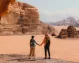 Couple experiencing the iconic desert scenery of Wadi Rum.
