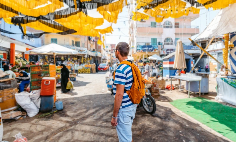 Man Shopping In The Street Market In Hurghada