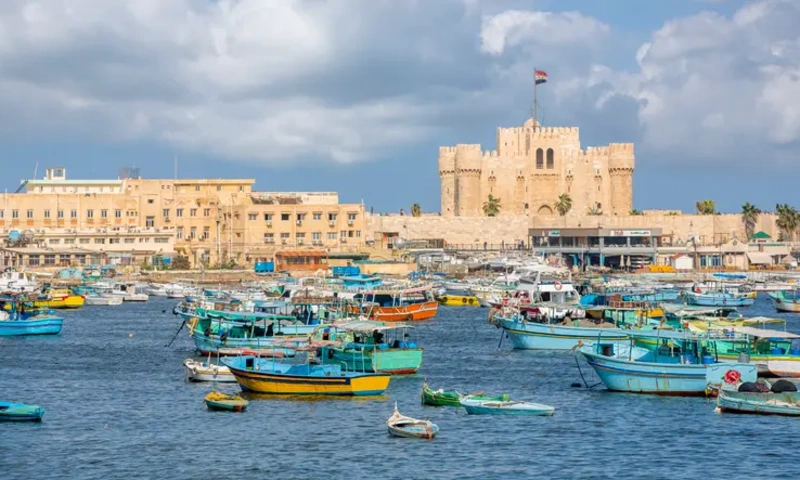View of Qaitbay citadel and boats in Alexandria city