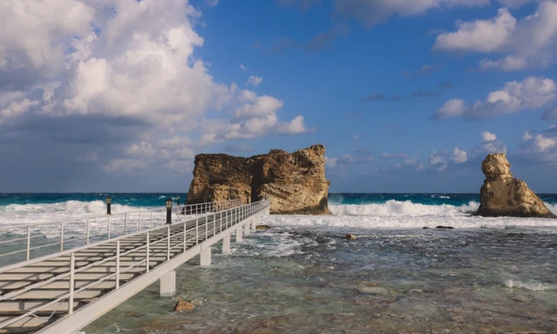Wooden Bridge to the Stone Rocky Formation on the Cleopatra Beach on the Mediterranean Sea Coastline near Marsa Matruh, Marsa Matrouh Egypt