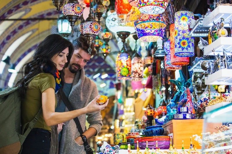 A couple shopping and exploring the vibrant Grand Bazaar in Istanbul.
