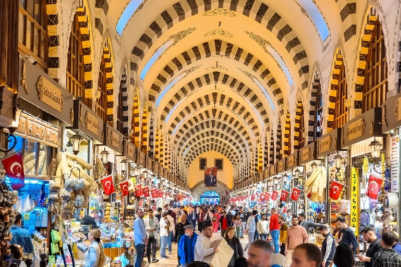 A bustling crowd shopping inside Istanbul’s Grand Bazaar.