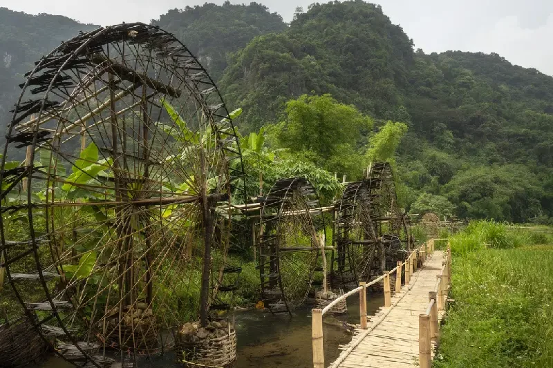 Bamboo water wheels supporting traditional farming in Pu Luong, Vietnam.