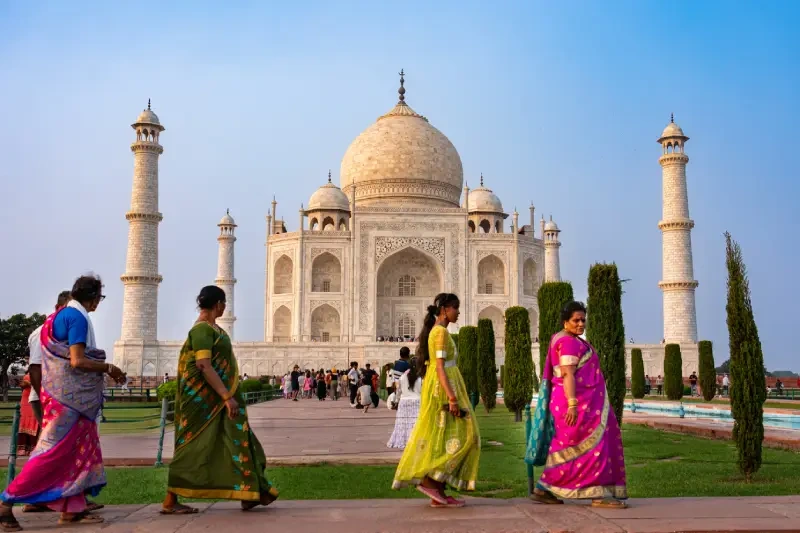 Indian visitors exploring the iconic Taj Mahal in Agra.