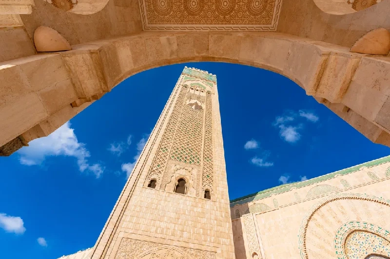 Dramatic low-angle shot of Casablanca’s Hassan II Mosque.