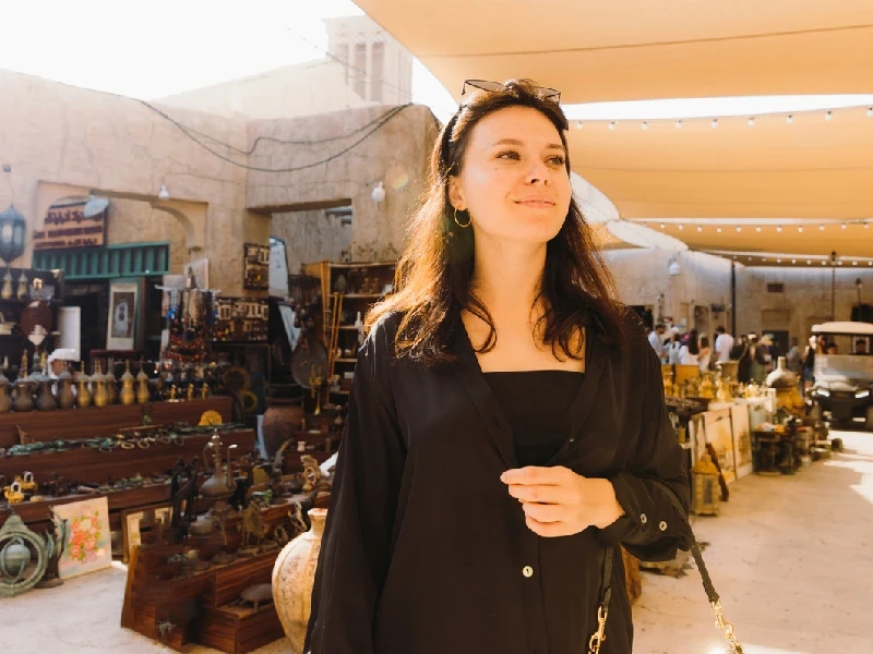 Traveler soaking up the atmosphere of Old Dubai.