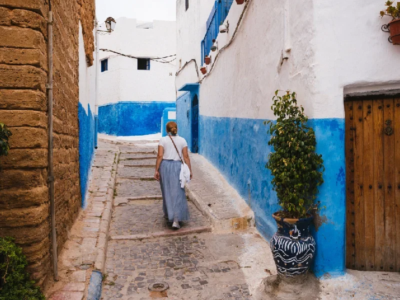 A female traveler strolling through the charming streets of Rabat.