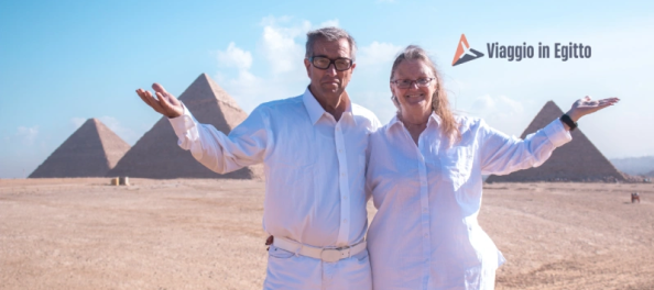 una coppia davanti alle piramidi, crociera sul nilo più mare