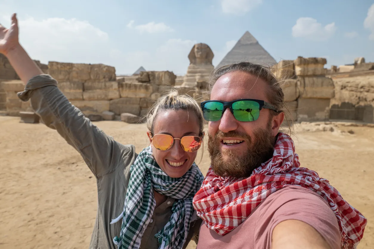 happy couples in front of the sphinx, Christmas Holiday in Egypt