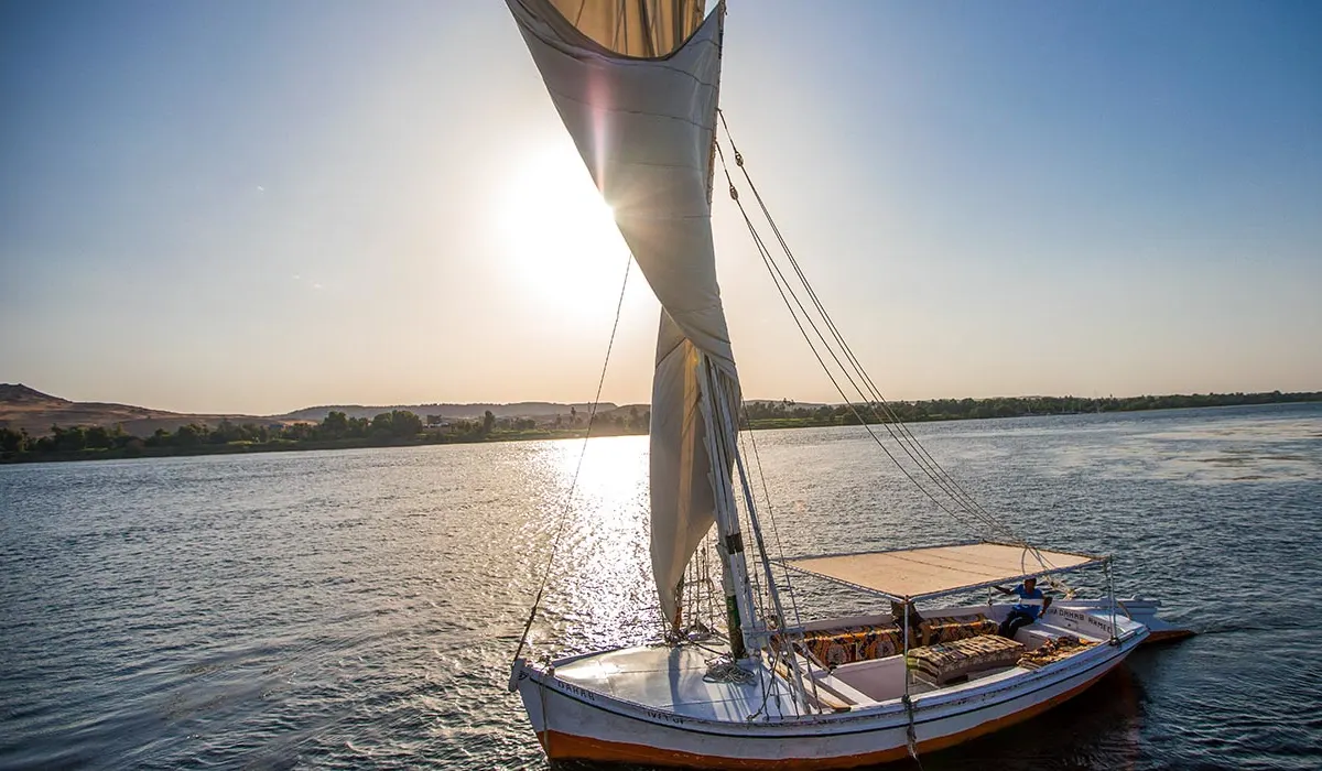 a Dahabiya sailing in Aswan 