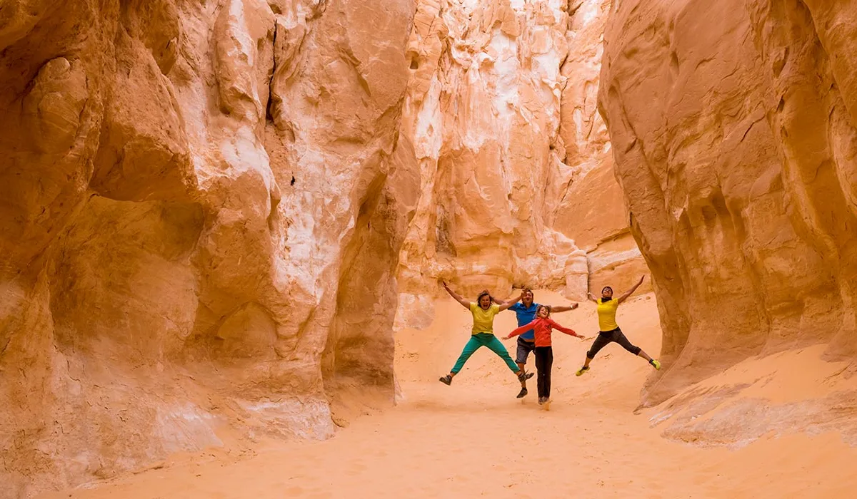 A group of tourists taking a photo.