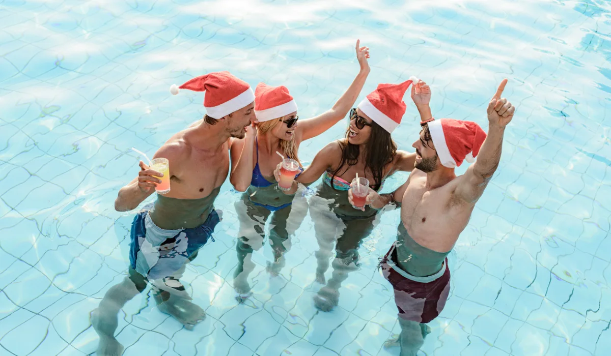 happy couples celebrating Christmas in the swimming pool, Christmas in Egypt