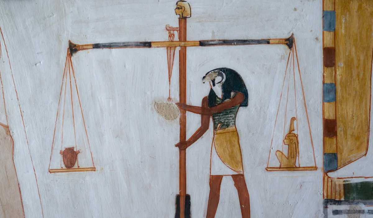 The god Horus weighs a heart against Maat in final judgment