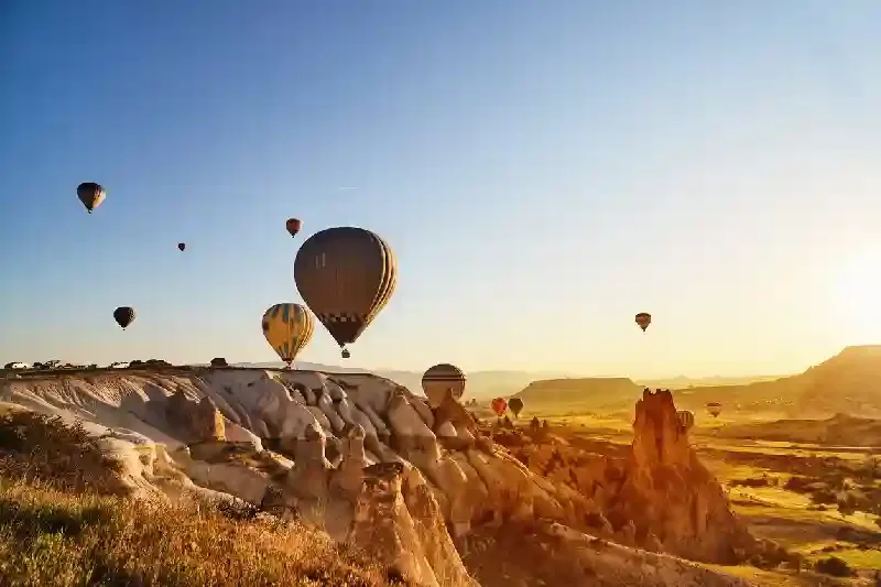 Mongolfiere che volano al tramonto, Cappadocia, Cappadocia turchia
