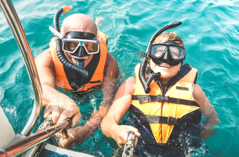 couple taking selfie with life jackets,  Best Snorkeling Sites in Red Sea