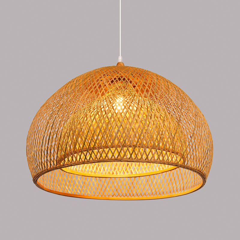 Grian Light Brown Single Pendant — hanging over a dining table
