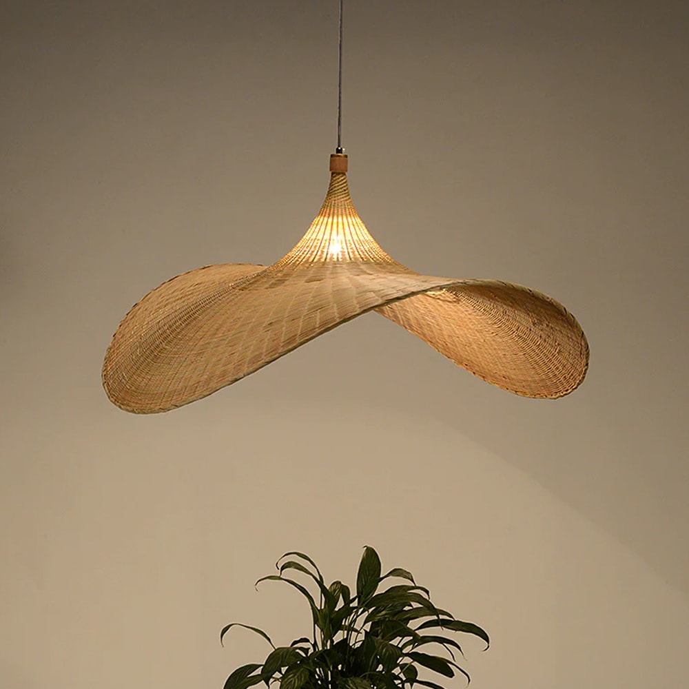 Luxury Bamboo Sphere Pendant — hanging over a dining table