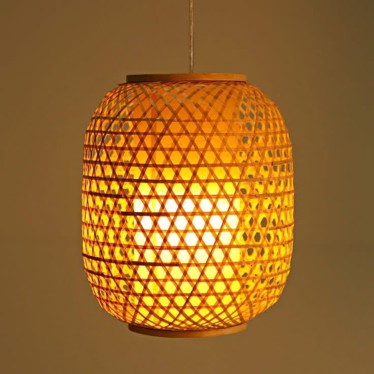 Handwoven Bamboo Bell Pendant — styled in a café interior thumbnail 3