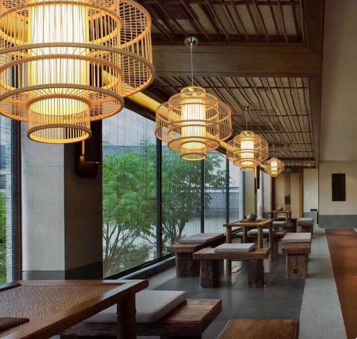 Bamboo Weave Hanging Light — draped along a living room wall thumbnail 4