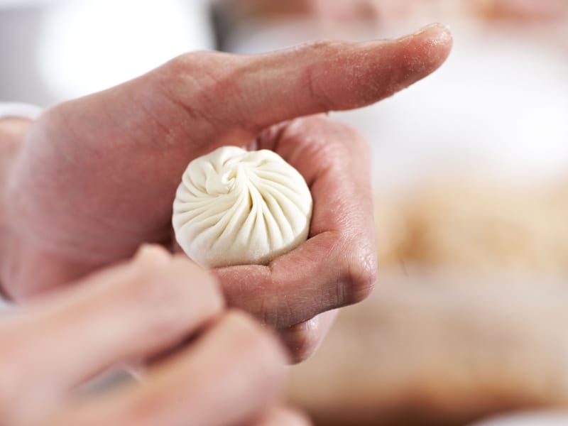 Savor the exquisite artistry of Michelin-starred soup dumplings.