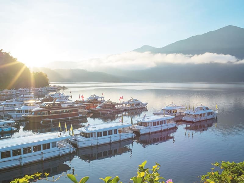 Enjoy the majestic scenery of Sun Moon Lake and go on a scenic shuttle boat tour