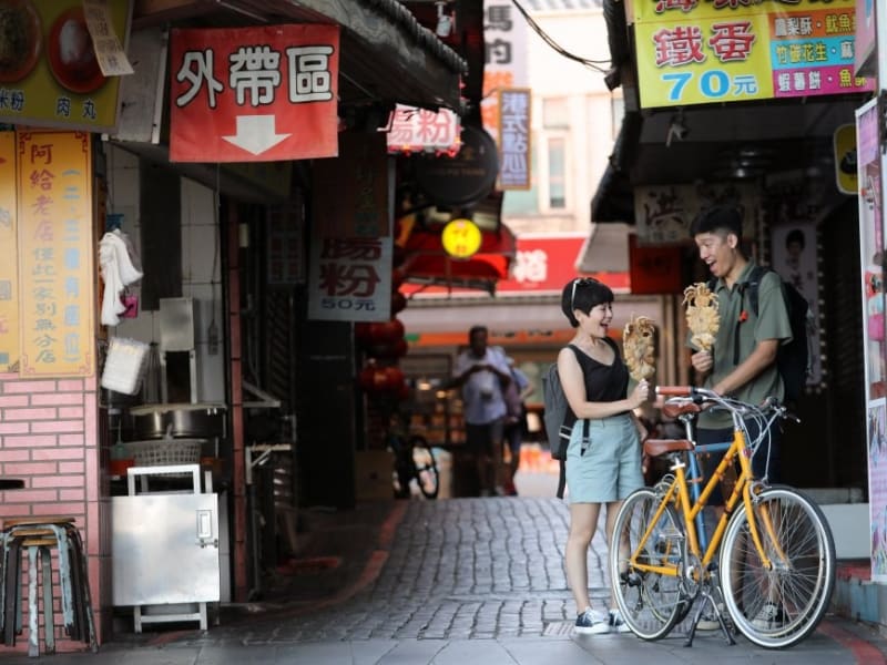 Explore Tamsui's old street by the wharf