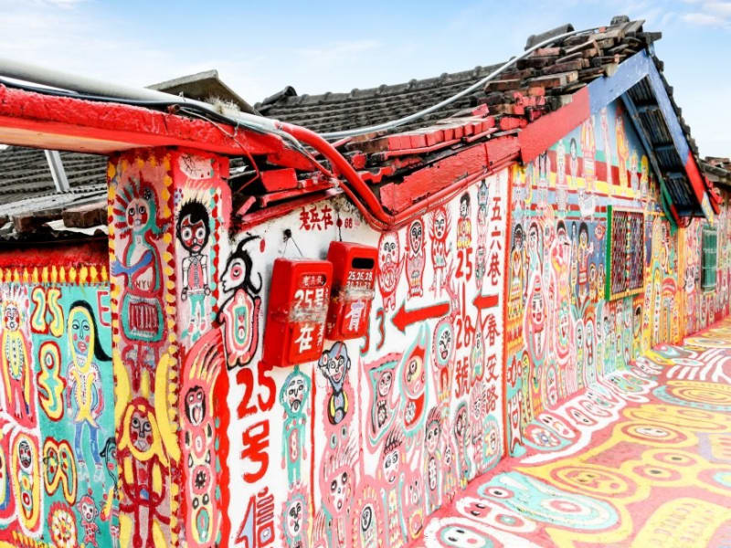 the quirky, psychedelic Rainbow Village (possibly meeting its creator, the extremely charming Rainbow Grandpa).